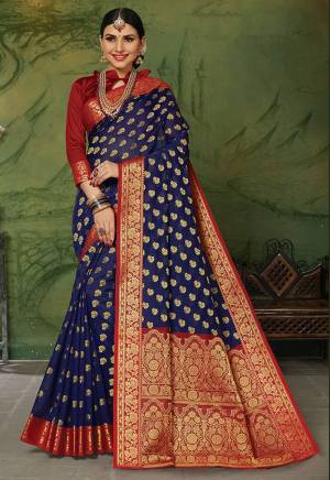 Flaunt Your Rich And Elegant Taste In Silk With This Subtle Weaved Saree In Navy Blue Color. This Saree And Blouse Are Fabricated On Art Silk Beautified With Pretty Small Butti Weave All Over It. Its Silk Based Fabric Will Give A Rich Look To Your Personality