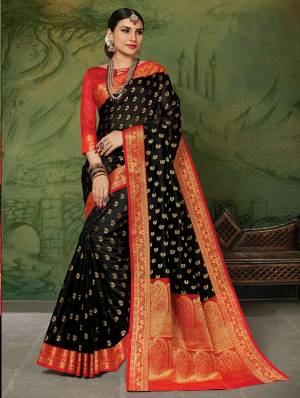 Flaunt Your Rich And Elegant Taste In Silk With This Subtle Weaved Saree In Black Color. This Saree And Blouse Are Fabricated On Art Silk Beautified With Pretty Small Butti Weave All Over It. Its Silk Based Fabric Will Give A Rich Look To Your Personality