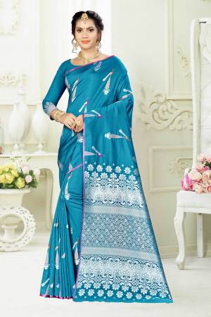 Enhance Your Personality Wearing This Designer Silk Based Saree In Blue Color Paired With Blue Colored Blouse. This Saree And Blouse Are Fabricated On Banarasi Art Silk Beautified With Pretty Motif Weave. 
