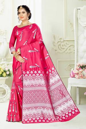 Enhance Your Personality Wearing This Designer Silk Based Saree In Pink Color Paired With Pink Colored Blouse. This Saree And Blouse Are Fabricated On Banarasi Art Silk Beautified With Pretty Motif Weave. 