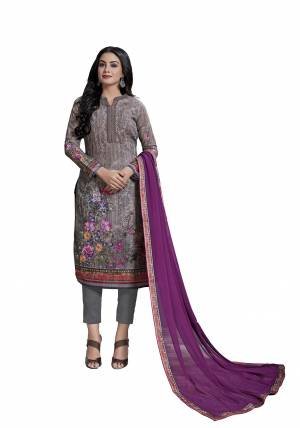 New Shade Is Here To Add Into Your Wardrobe With This Designer Straight Suit In Mauve Colored Top Paired With Grey Colored Bottom And Purple Colored Dupatta. Its Top Is Cotton Based Paired With Viscose Bottom And Chiffon Fabricated Dupatta. 