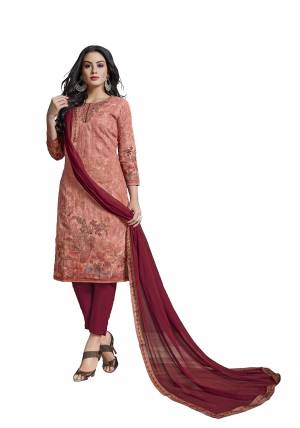 Look Pretty Wearing This Designer Straight Suit In Peach Colored Top Paired With Contrasting Maroon Colored Bottom And Dupatta. Its Heavy Embroidered Top Is Fabricated On Cotton Paired With Viscose Bottom And Chiffon Fabricated Dupatta. Its Fabrics Ensures Superb Comfort All Day Long. 