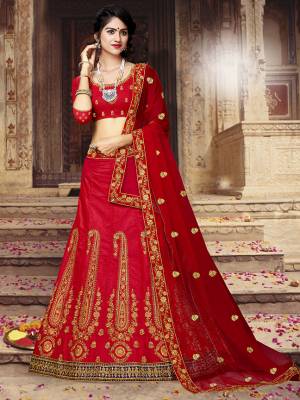 Catch All The Limelight At The Next Wedding You Attend Wearing This Very Beautiful Lehenga Choli In All Over Red Color. This Lehenga Choli Is Silk Based Paired With Net Fabricated Dupatta. 
