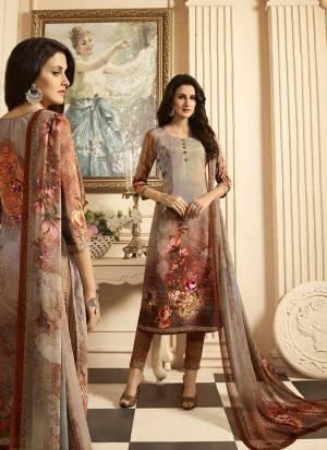 For Your Semi-Casuals Or Festive Wear, Grab This Pretty Digital Printed Suit In Grey And Brown Color. Its Top and Bottom Are Fabricated on Crepe Paired With Georgette Fabricated Dupatta. It IS Beautified With Digital Prints All Over It. 