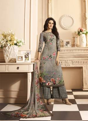 For Your Semi-Casuals Or Festive Wear, Grab This Pretty Digital Printed Suit In Grey Color. Its Top and Bottom Are Fabricated on Crepe Paired With Georgette Fabricated Dupatta. It IS Beautified With Digital Prints All Over It. 