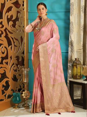 Get Ready For The Upcoming Wedding Season With This Heavy Designer Saree In Baby Pink Color. This Saree And Blouse Are Fabricated On Soft Silk Beautified With Jari Embroidery And Stone Work. Its Pretty Jari Work Gives A Rich And Subtle Look To Your Personality. 