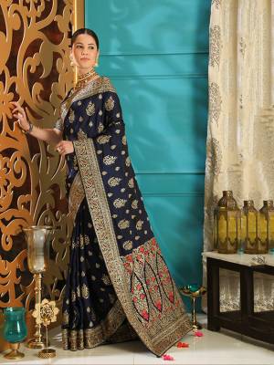 Enhance Your Personality In This Heavy Embroiderd Designer Saree In Navy Blue Color. This Saree And Blouse Are Fabricated on Soft Silk Which IS Light Weight And Durable. Buy Now.