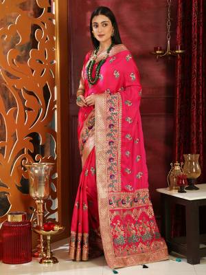 Grab This Very Pretty Heavy Embroidered Silk Based Saree In Dark Pink Color Paired With Dark Pink Colored Blouse. This Pretty Saree Is Suitable For Any Wedding Function Or Festive Wear.
