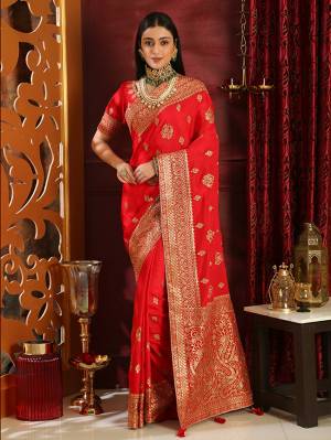 Get Ready For The Upcoming Wedding Season With This Heavy Designer Saree In Red Color. This Saree And Blouse Are Fabricated On Soft Silk Beautified With Jari Embroidery And Stone Work. Its Pretty Jari Work Gives A Rich And Subtle Look To Your Personality. 