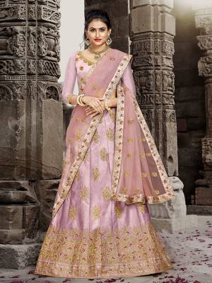 Grab This Very Beautiful And Elegant Looking Designer Lehenga Choli In All Over Pink Color. Its Blouse Is Fabricated On Art Silk Paired With Satin Silk Fabricated Lehenga And Net Fabricated Dupatta. It Is Beautified With Jari And Resham Embroidery With Stone Work. Buy Now.