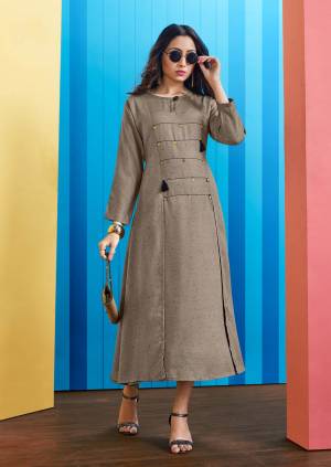 Elegant And rich Looking Designer Readymade Kurti Is Here In Grey Color Fabricated On Rayon Slub. This Kurti IS Beautified With Buttons And Tassels. Also It Is Light Weight And Durable. 