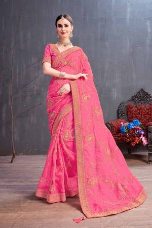 Get Ready For The Upcoming Festive And Wedding Season With This Heavy Designer Saree In Dark Pink Color. This Pretty Saree Is Fabricated On Orgenza Paired With Art Silk Fabricated Blouse. It Is Beautified With Heavy Coding Embroidery With Sequence Work. Buy Now.
