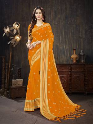 For A Rich And Elegant Look, Grab This Silk Based Designer Saree In Orange Color. This Saree And Blouse are Fabricated On Art Silk Beautified With Weave And Jari Embroidered Butti. Buy This Saree Now.
