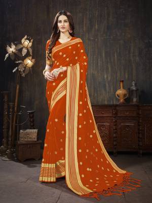For A Rich And Elegant Look, Grab This Silk Based Designer Saree In Rust Orange Color. This Saree And Blouse are Fabricated On Art Silk Beautified With Weave And Jari Embroidered Butti. Buy This Saree Now.