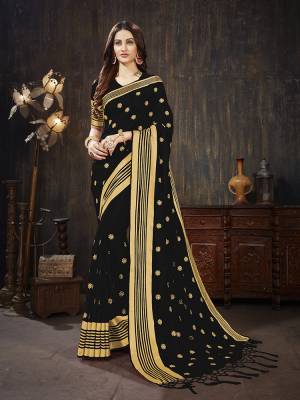 For A Rich And Elegant Look, Grab This Silk Based Designer Saree In Black Color. This Saree And Blouse are Fabricated On Art Silk Beautified With Weave And Jari Embroidered Butti. Buy This Saree Now.