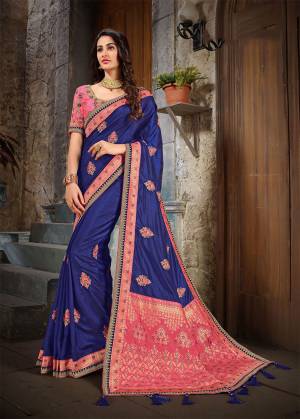 Attract All Wearing This Designer Silk Based Saree In Royal Blue Color Paired With Contrasting Pink Colored Blouse. This Saree Is Fabricated On Art Silk And Jacquard Silk Beautified With Weaved Pallu And Embroidery.