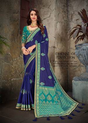 Attract All Wearing This Designer Silk Based Saree In Royal Blue Color Paired With Contrasting Sea Green Colored Blouse. This Saree Is Fabricated On Art Silk And Jacquard Silk Beautified With Weaved Pallu And Embroidery.