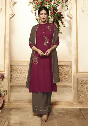Add This Beautiful Color Pallete To Your Wardrobe With This Designer Readymade Straight Cut Plazzo Suit In Maroon And Brown Color. Its Top Is Fabricated On Viscose Rayon Paired With Muslin Plazzo And Dupatta. Its Top Is Beautified With Attractive Embroidery. Buy This Fully Stitched Suit Now.