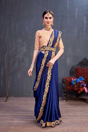 Grab This Very Attractive And Designer Piece For The Upcoming Wedding Season With This Saree In Royal Blue Color Paired With Contrasting Sea Green Colored Blouse. This Saree Is Fabricated On Soft Silk Paired With Art Silk Fabricated Blouse. It Has Attractive Coding Embroidery Over The Blouse And Saree Lace Border. 