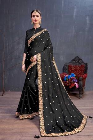 For A Bold And Beautiful Look In Traditionals, Grab This Designer Saree In Black Color Paired With Black Colored Blouse. This Saree Is Fabricated On Soft Silk Paired With Art Silk Fabricated Blouse. Its Rich Silk Fabric And Bold Color Will Earn You Lots Of Compliments From Onlookers. 