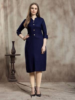 Simple And Elegant Readymade Plain Kurti Is Here In Navy Blue Color For Your Casual Wear. This Kurti Is Fabricated On Rayon And Available In All Regular Sizes. It Is Suitable For College Wear, Home Or Work Place. 