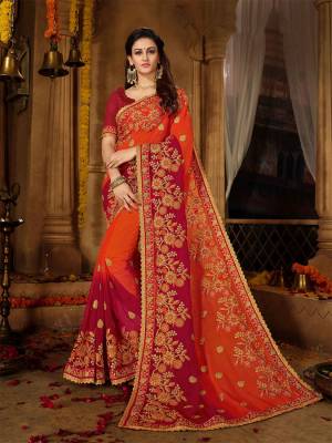 For A Proper Traditional Look, Grab This Heavy Designer Saree In Orange And Red Color Paired With Red Colored Blouse. This Heavy Embroidered Saree Is Fabricated On Georgette Paired With Art Silk Fabricated Blouse .