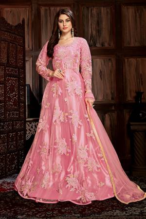 Look Beautiful In This Heavy Designer Floor Length Suit In All Over Pink Color. Its Heavy Embroiderded Top Is Fabricated On Net Paired With Santoon Bottom And Net Fabricated Dupatta. Its Top Is Beautified With Heavy Resham And Coding Work With Glitter Sequence Giving It An Attractive Look. 