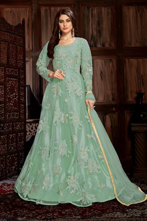 Look Beautiful In This Heavy Designer Floor Length Suit In All Over Aqua Blue Color. Its Heavy Embroiderded Top Is Fabricated On Net Paired With Santoon Bottom And Net Fabricated Dupatta. Its Top Is Beautified With Heavy Resham And Coding Work With Glitter Sequence Giving It An Attractive Look. 