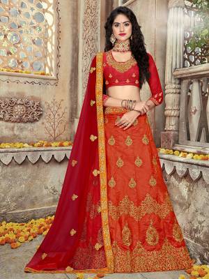Get Ready For The Upcoming Festive And Wedding Season Wearing This Heavy Designer Silk Based Lehenga Choli In All Over Red Color, Its Blouse And Lehenga Are Fabricated on Art silk Paired With Net Fabricated Dupatta. 