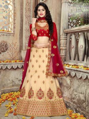 Evergreen Combination Is Here With This Designer Lehenga Choli In Red And Cream Color. Its Embroidered Blouse are lehenga are Fabricated On Art Silk Paired With Net Fabricated Dupatta. Buy Now.