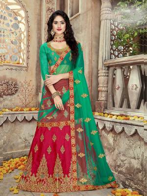 Here Is a Proper Ethnic Color Combination With This Heavy Designer Lehenga Choli In Red And Green color. This Lehenga Choli Is Fabricated On Art Silk Paired With Net Fabricated Dupatta. Buy Now.