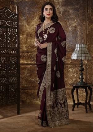 Enhance Your Personality In This Rich And Elegant Looking Heavy Designer Saree In Maroon Color, This Heavy Embroidered Saree And Blouse Are Fabricated On Art Silk Beautified With Embroidery. Its Rich Fabric And Bold Color Will Earn You Lots Of Compliments From Onlookers. 