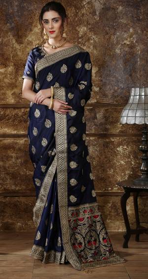Enhance Your Personality In This Rich And Elegant Looking Heavy Designer Saree In Navy Blue Color, This Heavy Embroidered Saree And Blouse Are Fabricated On Art Silk Beautified With Embroidery. Its Rich Fabric And Bold Color Will Earn You Lots Of Compliments From Onlookers. 