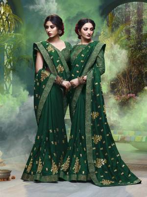 Celebrate This Festive Season With Beauty And Comfort Wearing This Designer Silk Based Saree In Green Color. This Saree And Blouse are Beautified With Attractive Foil Print All Over It, Also It Is Light Weight And Easy To Carry All Day Long. 