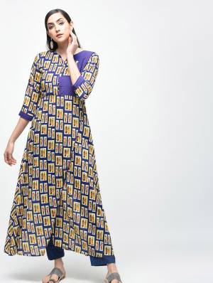 Grab This Readymade Long Kurti In Blue Color Beautified With Prints All Over. This Pretty Kurti Is Cotton Based And Available In All Regular Sizes. 