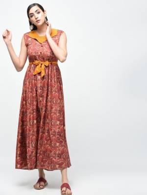For Your Semi-Casuals, Grab This Readymade Knee Length Kurti In Brown Color Which Is Cotton Based Beautified With Prints All Over. It Is Soft Towards Skin And Easy To Carry All Day Long. 