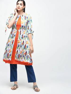 Be It Your College Wear, Home Or Work Place, This Readymade Kurti Is Suitable For All. This Orange And White Colored Knee Length Kurti Is Cotton Based Beautified With Prints. 