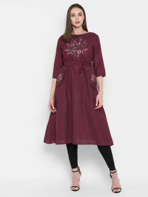 Look Pretty In This Designer Readymade Silk Based Kurti In Wine Color. Its Pretty Tunic Pattern With Thread Work Will Earn You Lots Of Compliments From Onlookers. 
