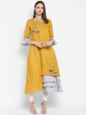 Celebrate This Festive Season Wearing This Designer Readymade Kurti In Yellow Color Fabricated Rayon. Its Pretty Unique Pattern And Elegant Color Pallete Will Earn you Lots Of Compliments From Onlookers. 