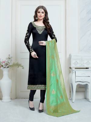 For A Bold and Beautiful Look, Grab This Heavy Designer Straight Suit In Black Color Paired With Green Colored Banarasi Silk Dupatta. Its Embroidered Top Is Satin Georgette Based Paired With Santoon Fabricated Bottom. All Its Fabrics are Light Weight And Easy To Carry All Day Long. 