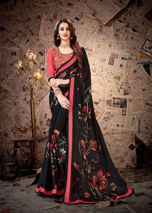 Grab This Very Beautiful Designer Saree In Black Color Paired With Pink Colored Blouse. Printed Saree Is Satin Georgette Based Paired With Cotton Slub Fabricated Heavy Embroidered Blouse. 