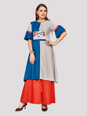 Be Its Your College, Home Or Work Place, This Readymade Kurti In Blue And Grey Color Is Suitable For All. It Is Fabricated On Rayon And Avialble In All Sizes. 