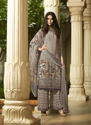 Here Is A Very Pretty Digital Printed Suit In Grey Color. Its Top And Bottom Are Fabricated On Crepe Paired With Georgette Fabricated Dupatta. Its Fabrics Are Soft Towards Skin Which Ensures Superb Comfort All Day Long. 
