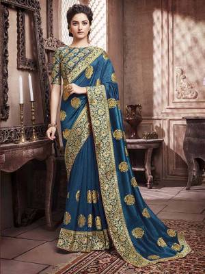Celebrate This Festive Season With Beauty And Comfort Wearing This Designer Silk Based Saree In Cobalt Blue Color. This Saree And Blouse are Beautified With Attractive Foil Print All Over It, Also It Is Light Weight And Easy To Carry All Day Long