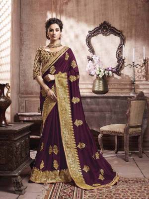 Grab This Beautiful Designer Silk Based Saree In Wine Color.?This Pretty Saree Has Attractive Foil Prints Which Gives A Heavy Look To It. It Is Suitable For Festive As Well As Wedding Season.