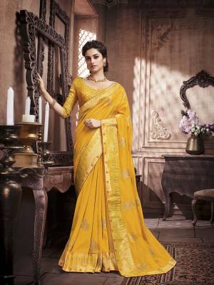 Celebrate This Festive Season With Beauty And Comfort Wearing This Designer Silk Based Saree In Musturd Yellow Color. This Saree And Blouse are Beautified With Attractive Foil Print All Over It, Also It Is Light Weight And Easy To Carry All Day Long