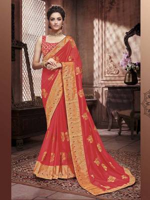 Grab This Beautiful Designer Silk Based Saree In Orange Color.?This Pretty Saree Has Attractive Foil Prints Which Gives A Heavy Look To It. It Is Suitable For Festive As Well As Wedding Season.