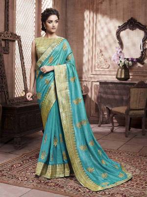 Celebrate This Festive Season With Beauty And Comfort Wearing This Designer Silk Based Saree In Blue Color. This Saree And Blouse are Beautified With Attractive Foil Print All Over It, Also It Is Light Weight And Easy To Carry All Day Long