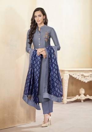 Beat The Heat This Summer With This Super Comfy Designer Readymade Suit In Dark Grey Color Paired Contrasting Navy Blue Colored Dupatta. Its Readymade Top IS Cotton Based Paired With Unstitched Cotton Bottom And Muslin Digital Printed Dupatta. It Is Light Weight, Durable And Easy To Care For. 