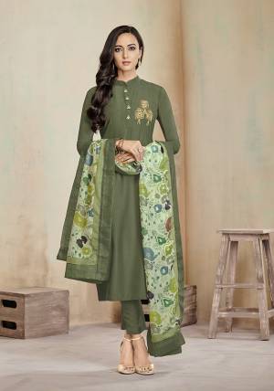 Grab This Designer Straight Suit In Olive Green Color Paired With Light Green Colored Printed Dupatta. This Suit Is Cotton Based Which Has Readymade Top With Unstitched Bottom And Muslin Fabricated Digital Printed Dupatta. 